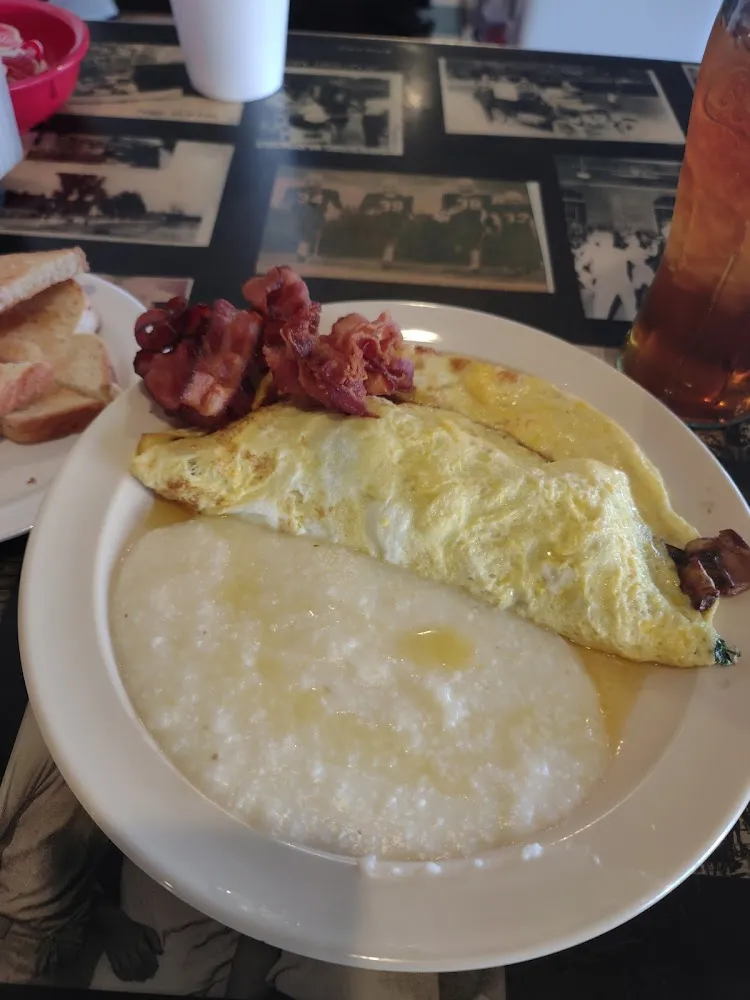 Spanish Omelette with Sauteed Mushrooms and Feta Cheese Grits Bacon and Toast